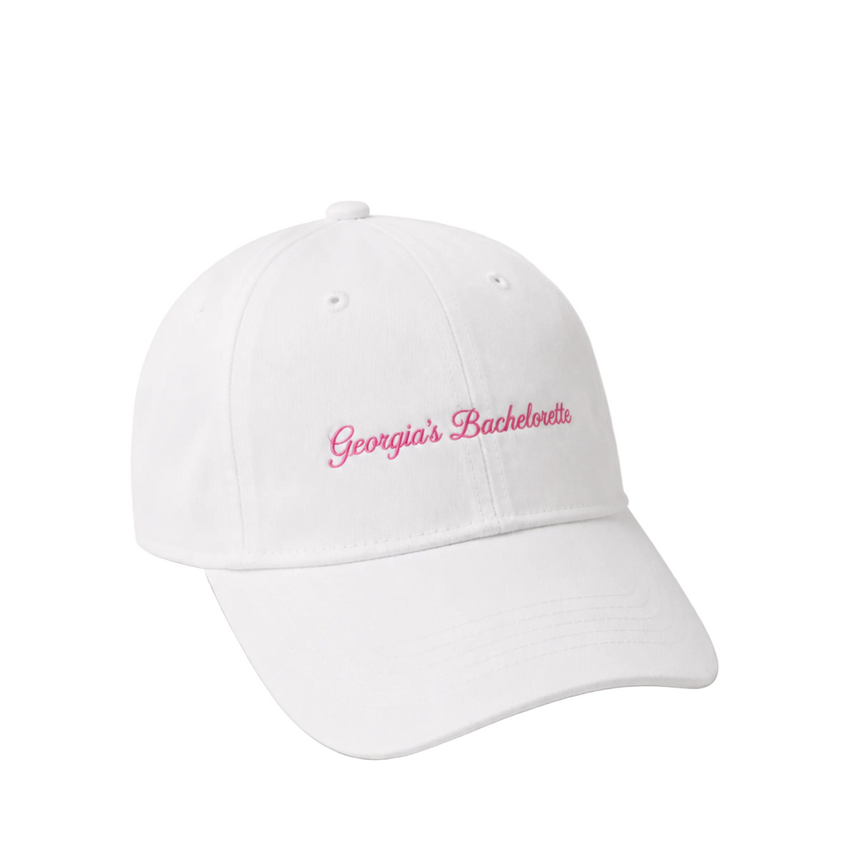 A white baseball cap with 'Georgia's Bachelorette' embroidered in pink script on the front, shown against a light gray background.